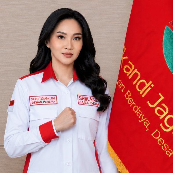 Ibu Sherly Tj. Laos